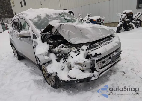 2014 Ford Escape Titanium from USA, damaged, VIN 1FMCU9J98EUE18496